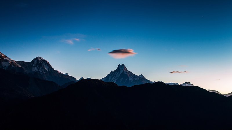 this Cloud UFO over the Mount Fishtail photo was taken during Poonhill trek, Nepal